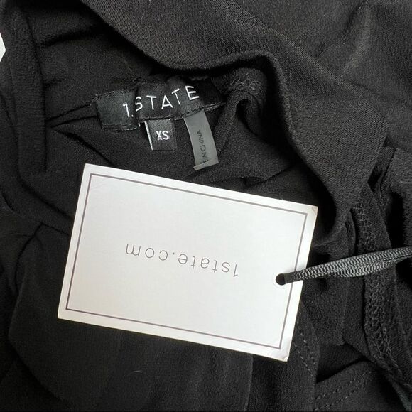 1. STATE Long Sleeve Asymmetric Cut Out Mock Neck Knit Top Black XS - Picture 8 of 8